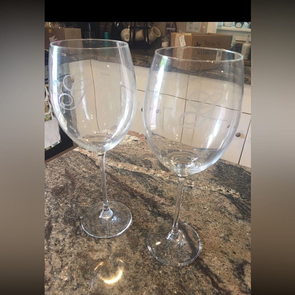 Long stem crystal wine glasses with G monogram